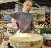Flaming Cheese Wheel and Wine Pairing Experience