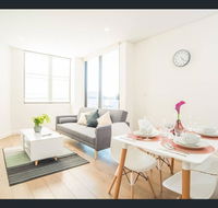 Gorgeous modern brand new two bedroom apartment with large lounge and private garden view balcony - Accommodation BNB