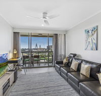 Luxurious harbour view apartment steps from city