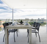Minimalist Penthouse Condo with Skyline Vistas - Accommodation BNB